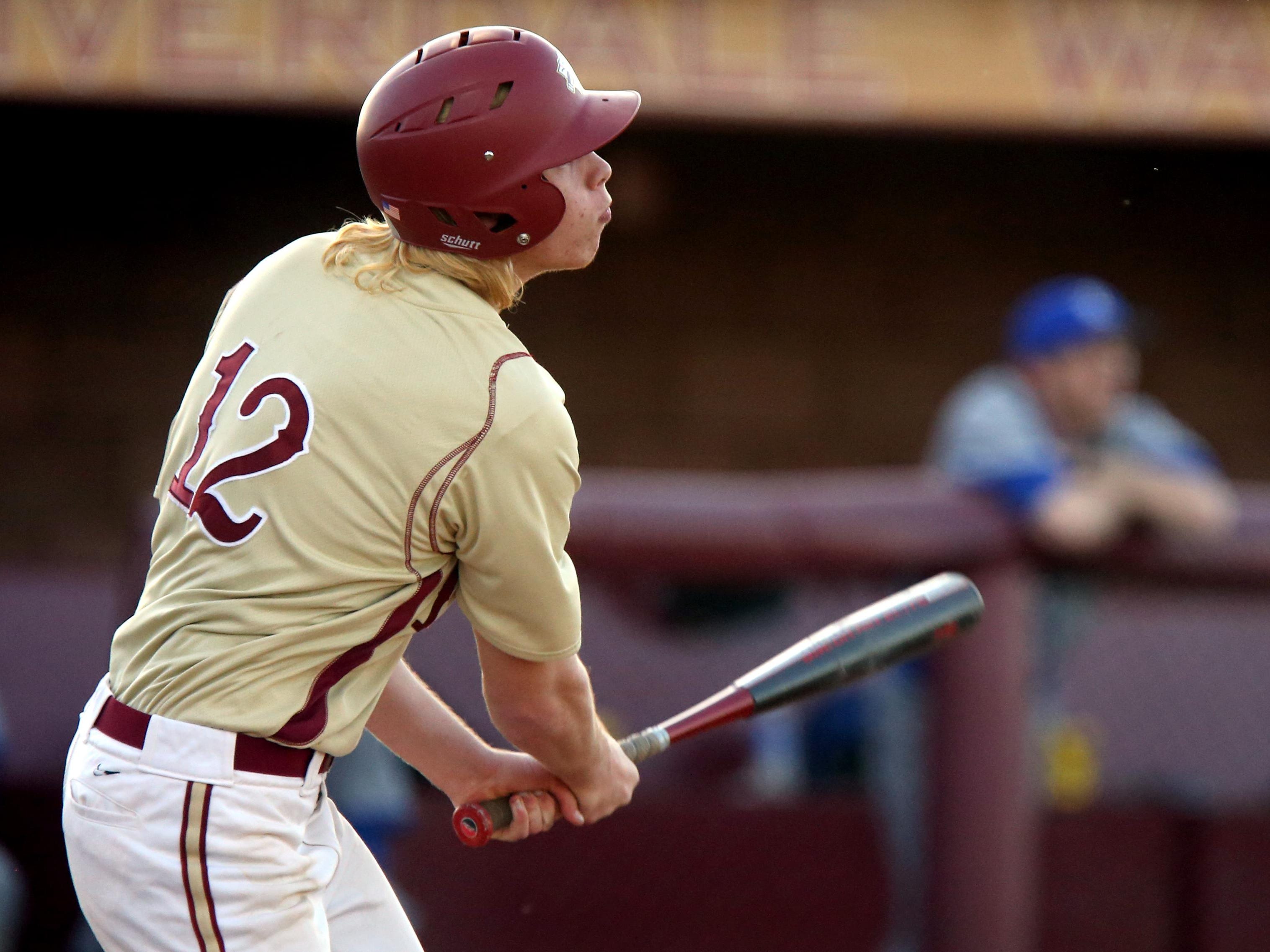Riverdale's Charlie Fultz watches as his ball goes over the fence after hitting a homerun against La Vergne during a game at Riverdale Monday March 16, 2015.