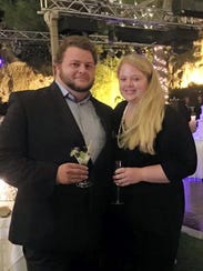 Alexander Pinczowski and his fiance Cameron Cain in