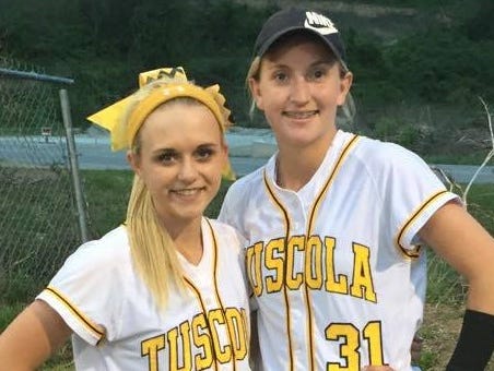 Tuscola catcher Heather Carver, left, and Melody Hannah.