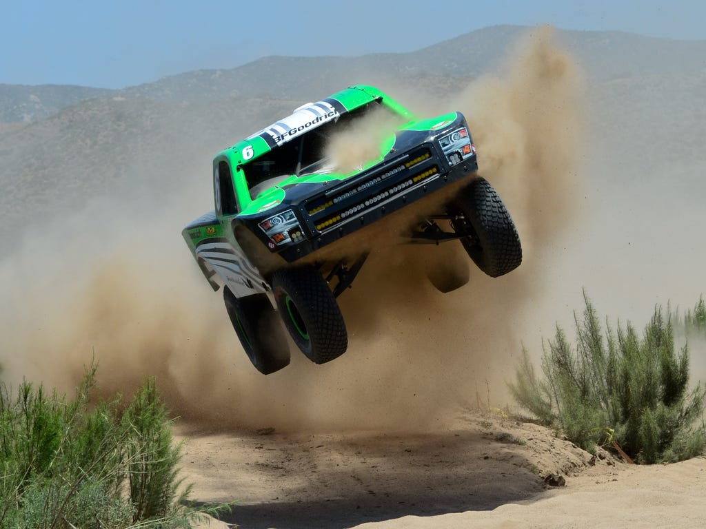 SCORE Trophy Truck driver Ricky Johnson jumps during qualifying for the Baja 500 in Uruapan, Mexico.