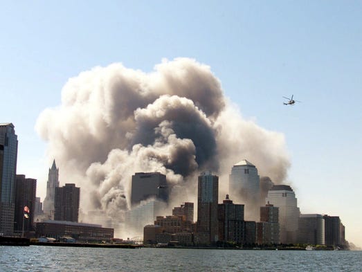 Smoke fills the air around the World Trade Center in
