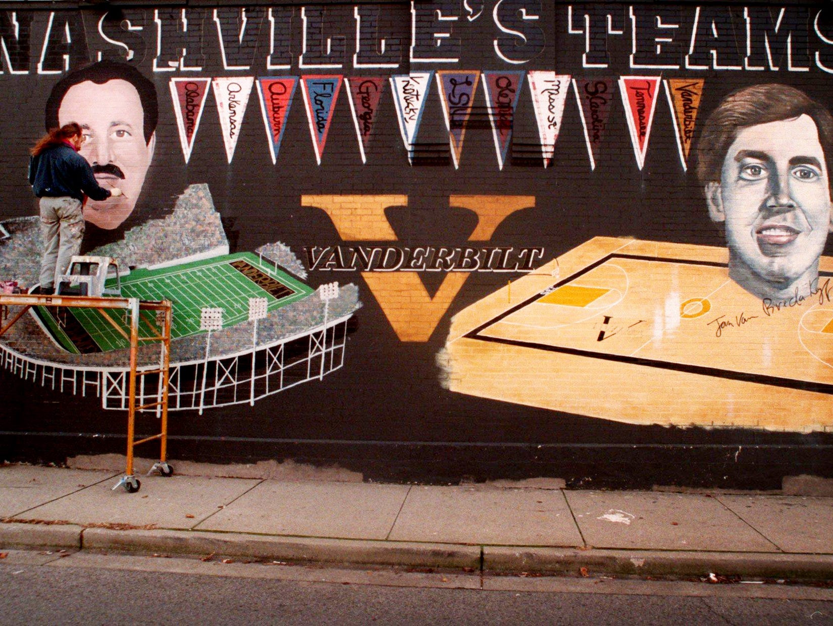 In 1996 Michael Cooper painted football coach Woody Widenhofer on the Vanderbilt mural on the wall of the building, which at the time was occupied by You Greek Me Greek.