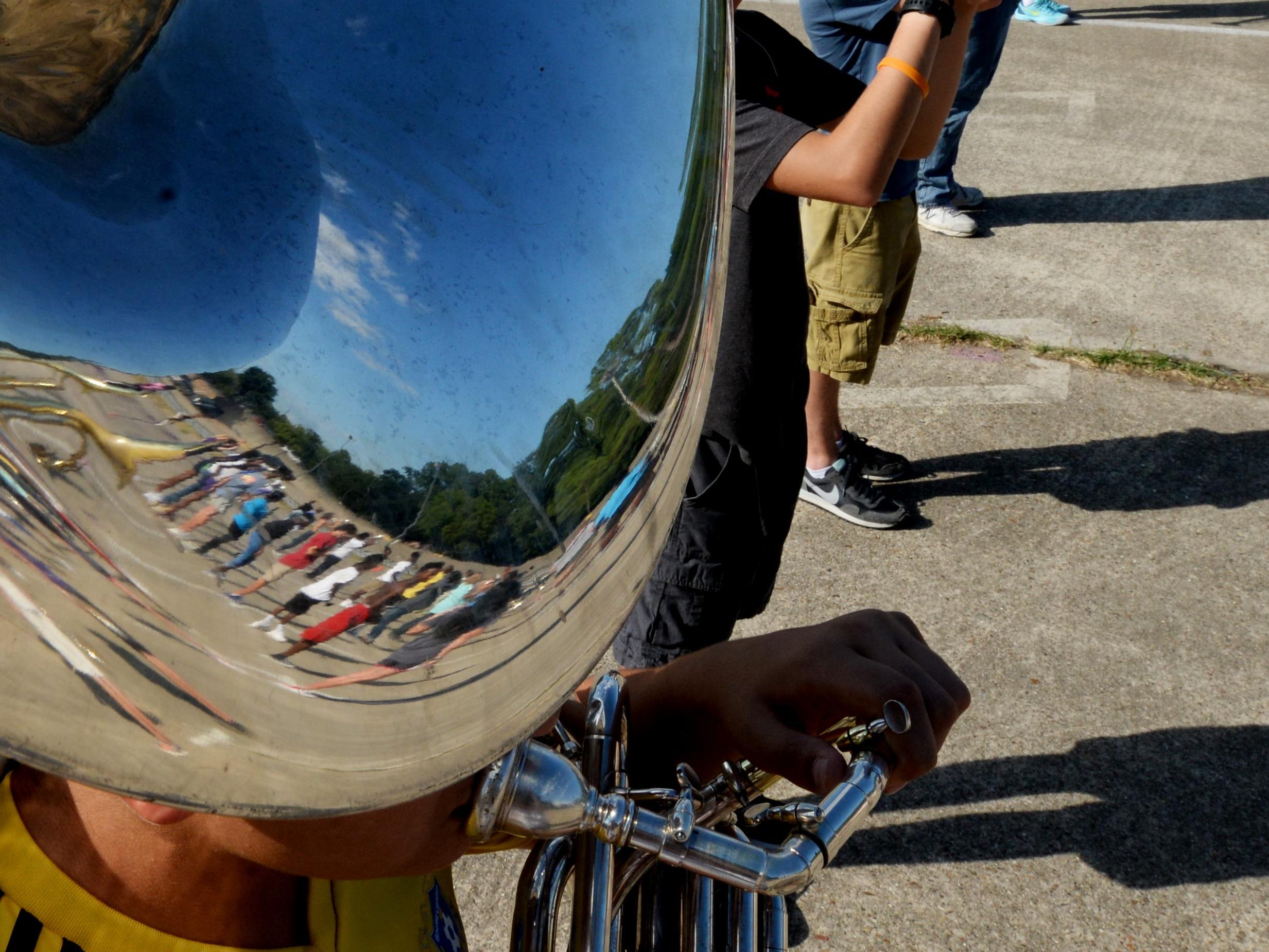 A reflection of Byrd's marching band can be seen in the sousaphone.