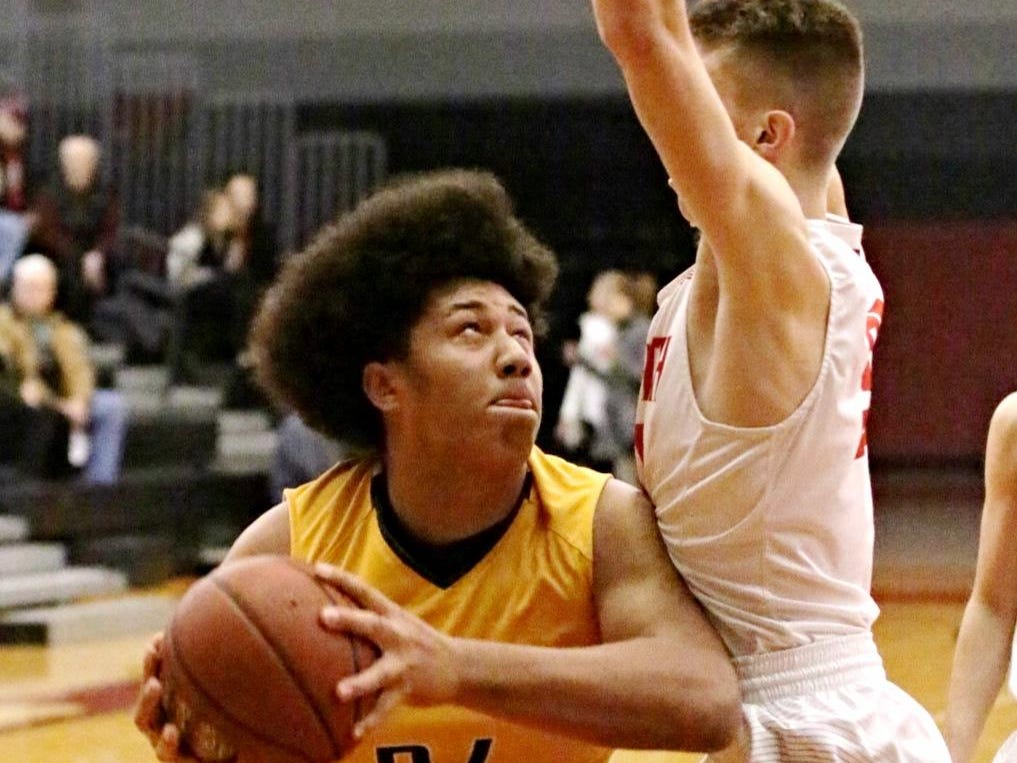 Ashwaubenon’s Kenneth Brooks looks to score inside at Sheboygan South on Thursday.