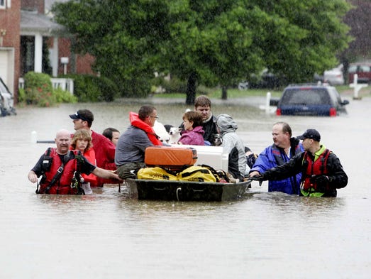 Residents are evacuated from flooded homes in Fieldstone