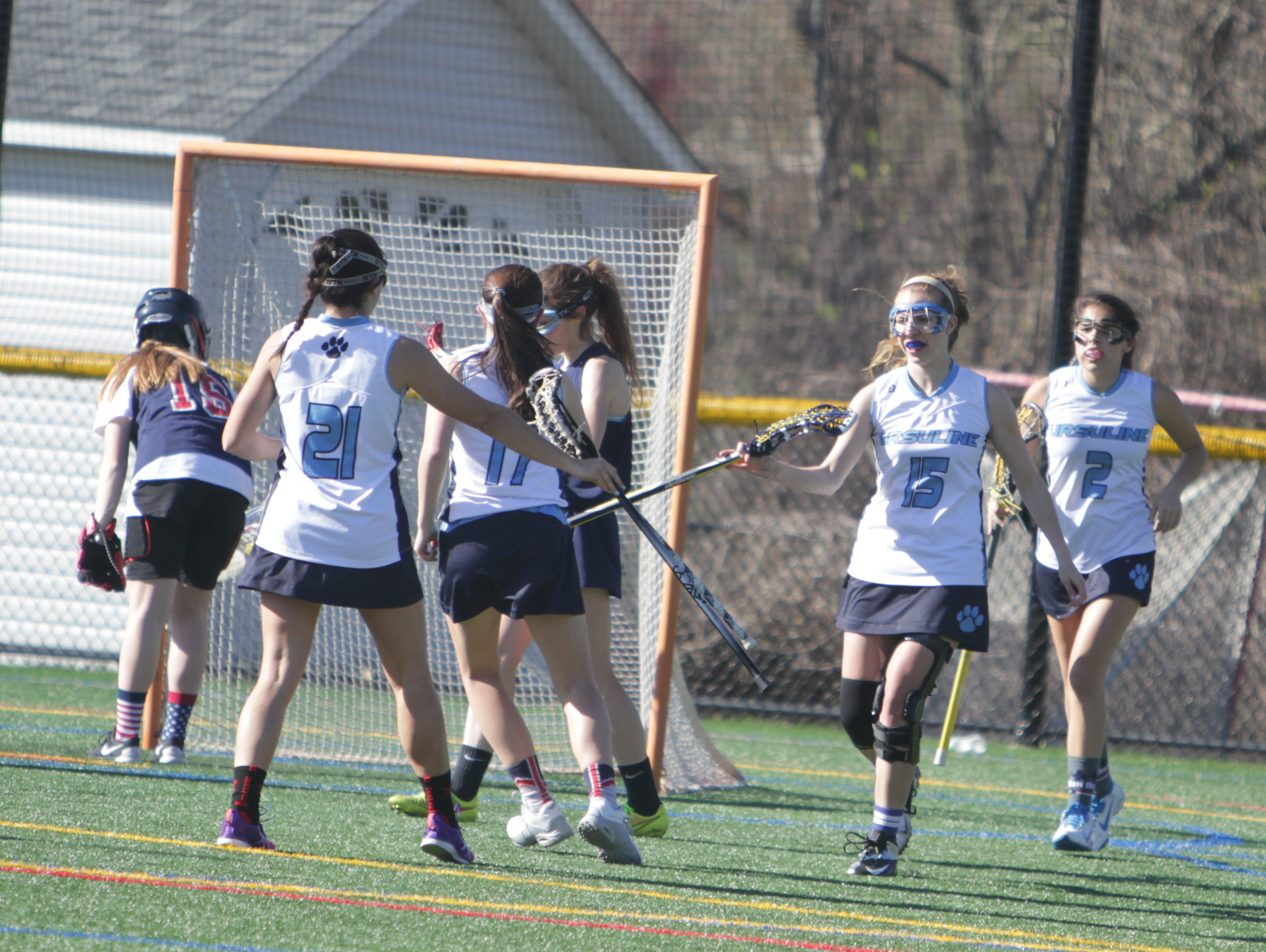 Ursuline celebrates after scoring a goal in the first half during a girls lacrosse game between Ursuline and Kennedy at the Ursuline School on Tuesday, April 19th, 2016. Ursuline won 18-10.