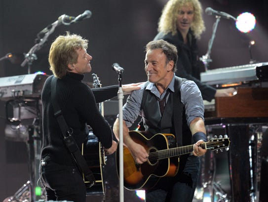 Bruce Springsteen and Jon Bon Jovi perform during 