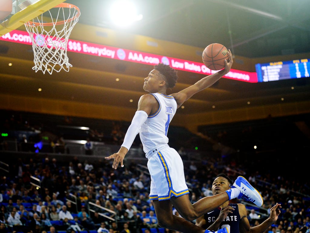 UCLA guard Jaylen Hands dunks to score against  South Carolina State during the second half at Pauley Pavilion.