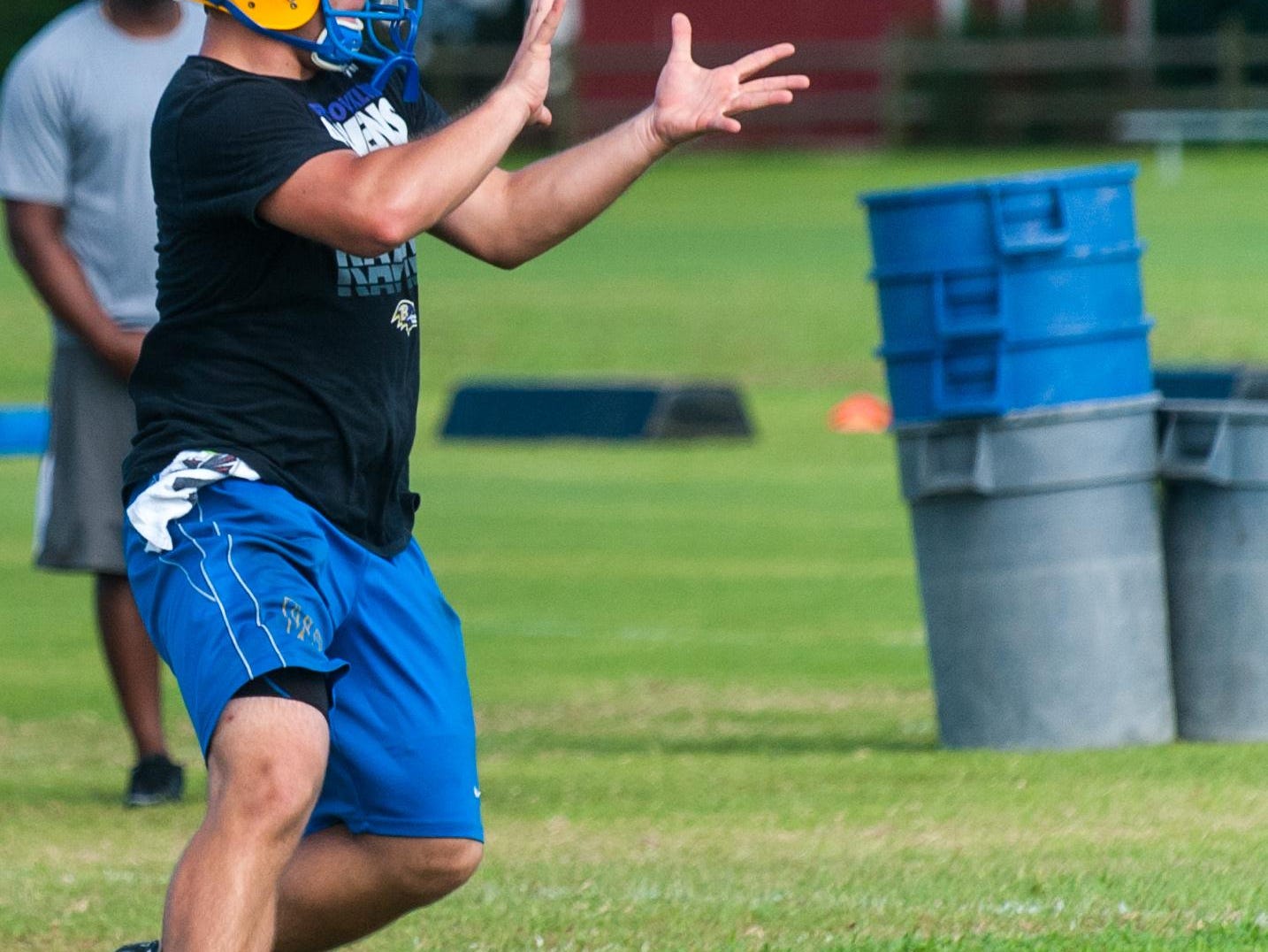 Wicomico High receivers and tight ends work through drills.