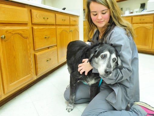 Sabrina Cornejo, 18, holds  Lita during an examination