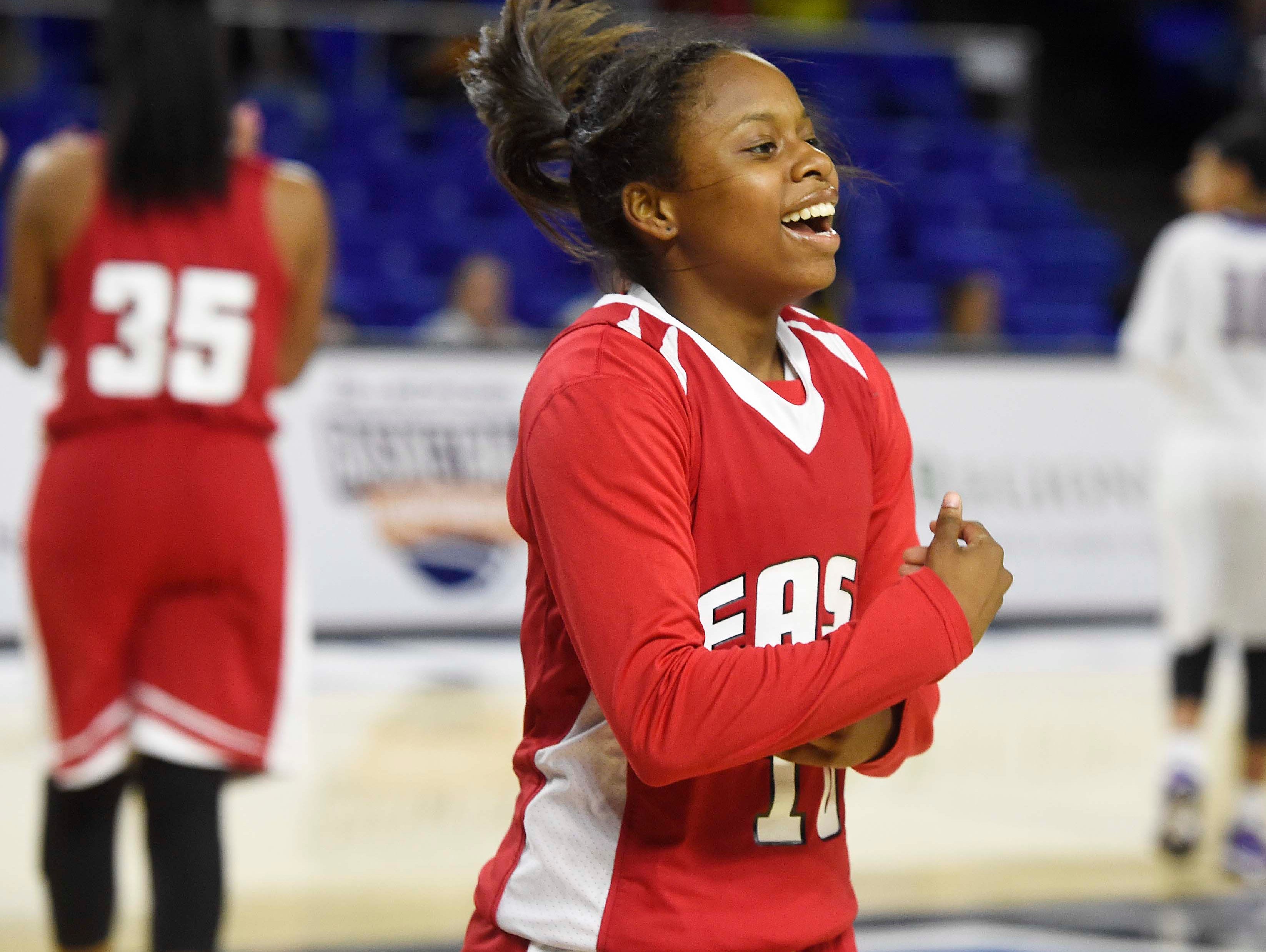 East's Le'Jzae Davidson (10) celebrates a victory as East Nashville wins 47-35 in the Division I Class AA Girl's basketball tournament at the Murphy Center on MTSU's campus March 10, 2016 in Murfreesboro, Tenn.