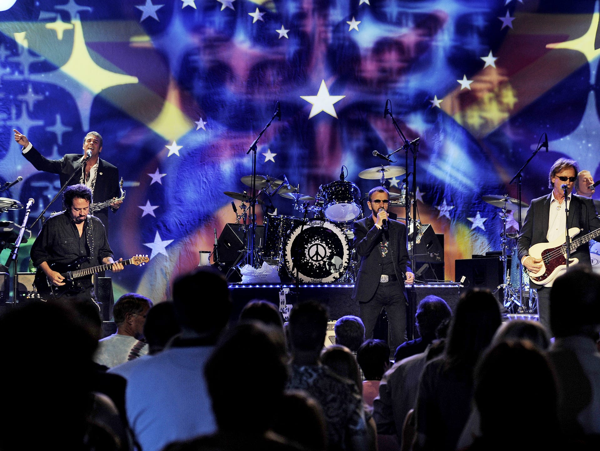 Ringo Starr, center, and his All Star Band are rocking