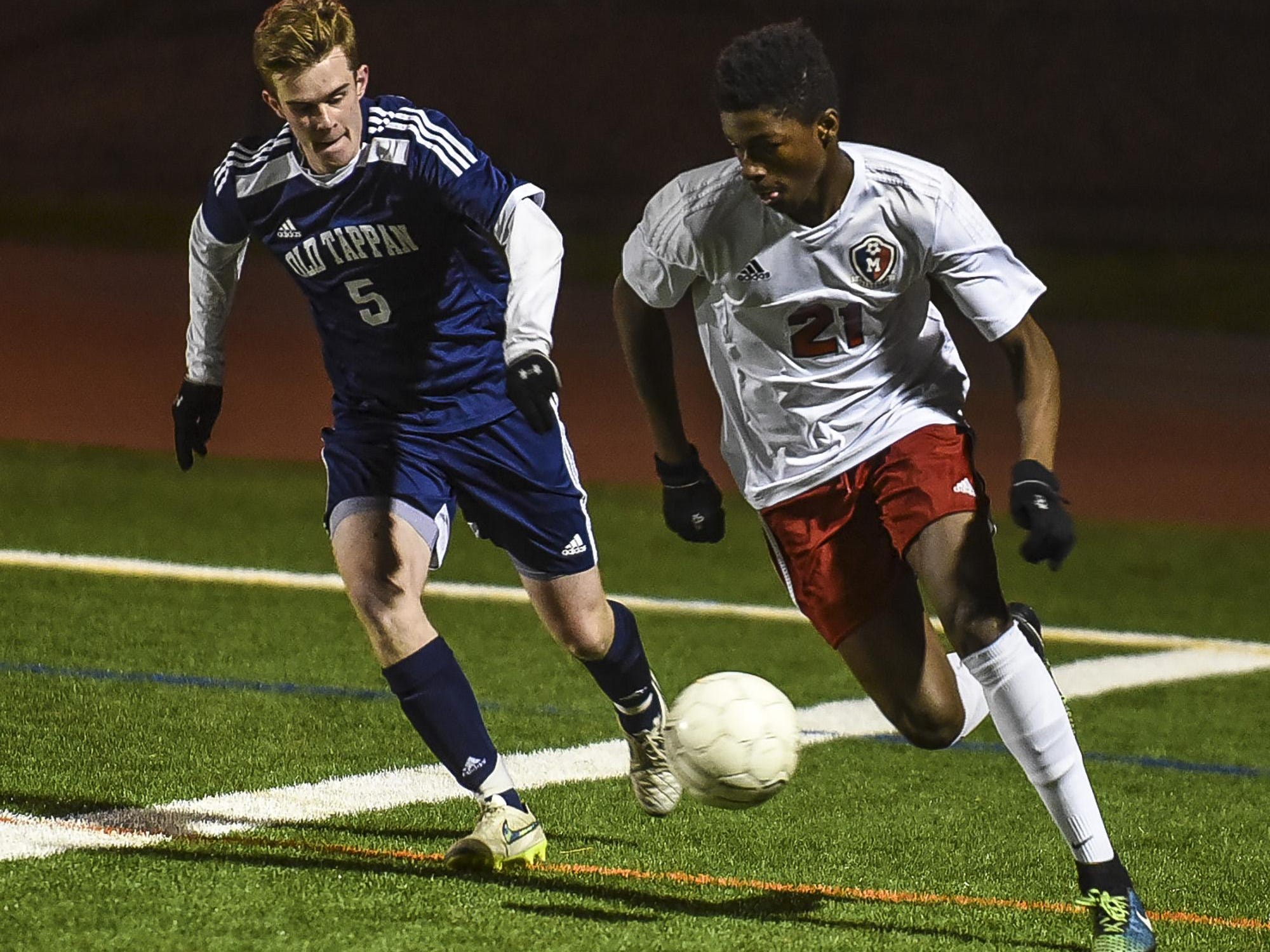 Old Tappan's Kevin Loudon (6) tries to pace Mendham's Julian Montilius (21)in the NJSIAA Group III Semifinal at Ridge High School in Basking Ridge, November 17, 2015. Photo by Warren Wetura for the Daily Record.