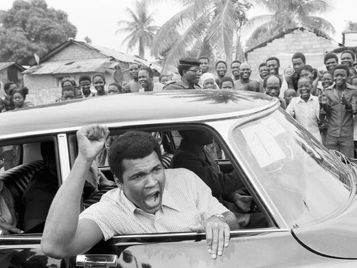 Boxer Muhammad Ali on a sightseeing tour downtown Kinshasa, Zaire, September 17, 1974.