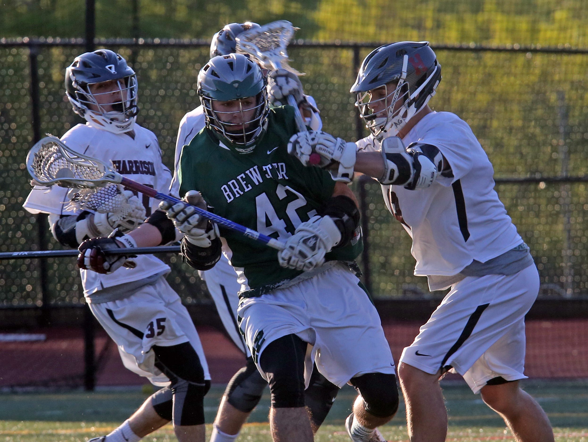 Brewster defeats Harrison 13-12 during boys lacrosse Section 1 Class B playoff game at Harrison High School on May 16, 2016.