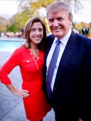 Tana Goertz, left, poses with Donald Trump.
