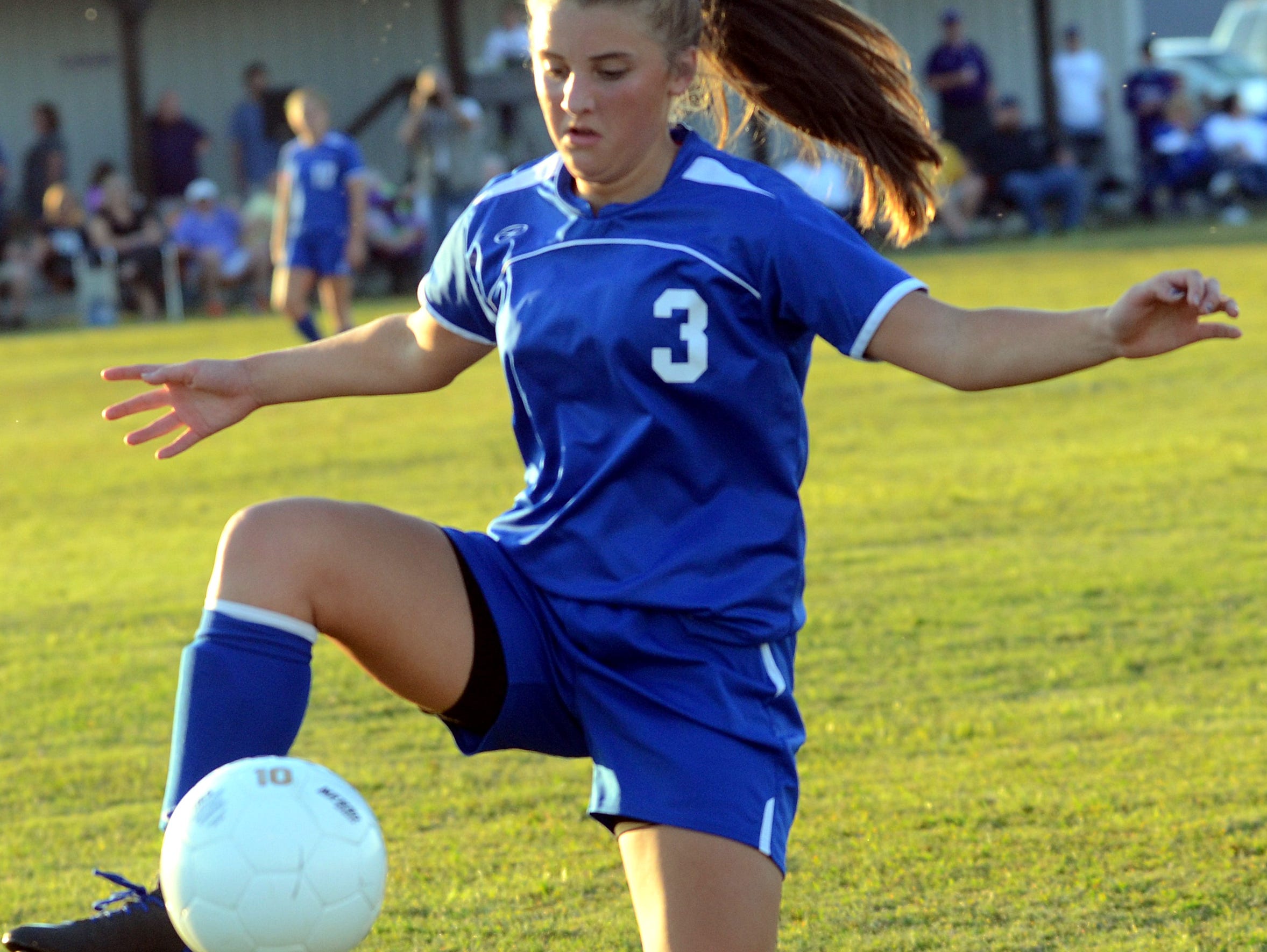 White House High sophomore Mallory Humphries controls a first-half throw-in.