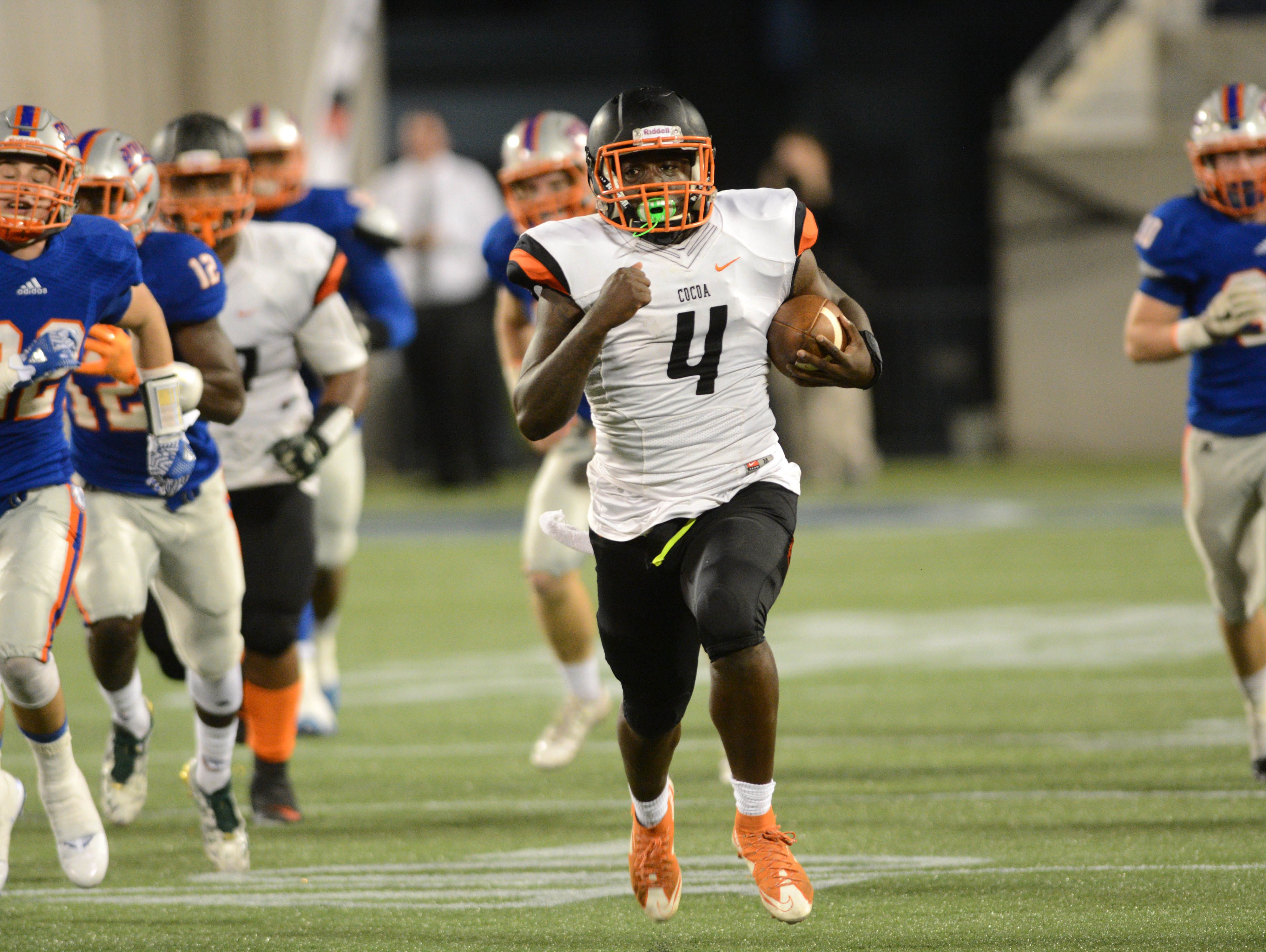 Bruce Judson of Cocoa goes 75 yards for a TD during Thursday's Class 4A championship game in Orlando.