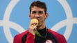 Michael Phelps won gold in the men's 200-meter individual