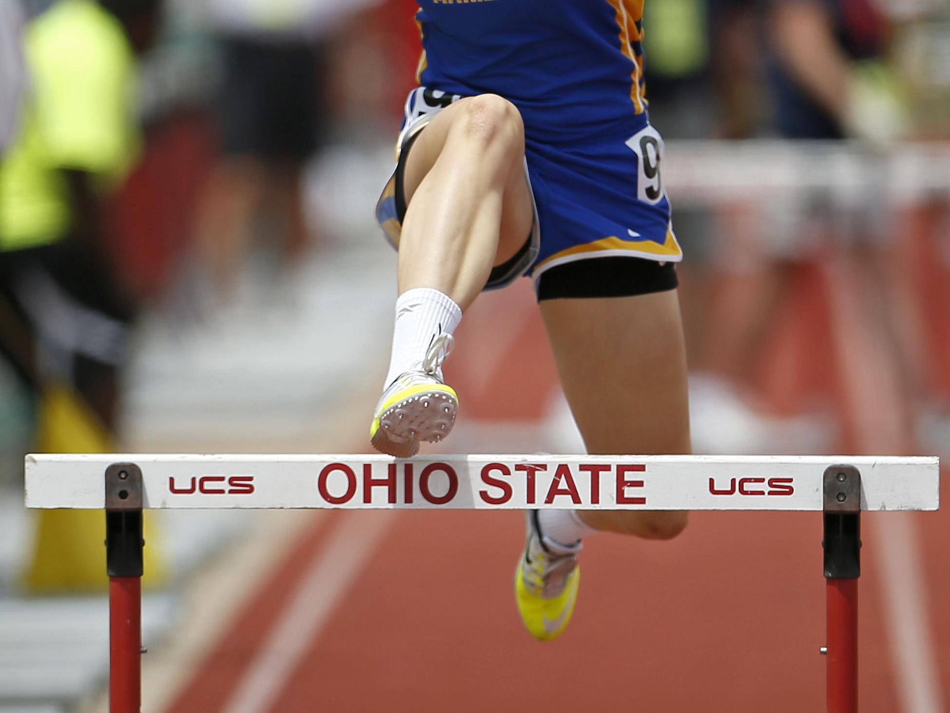 Mariemont's Carson Fields crosses the final hurdle in the 300-meter hurdles event at the OHSAA Division II state finals. Fields finished seventh with a time of 45.87 seconds.
