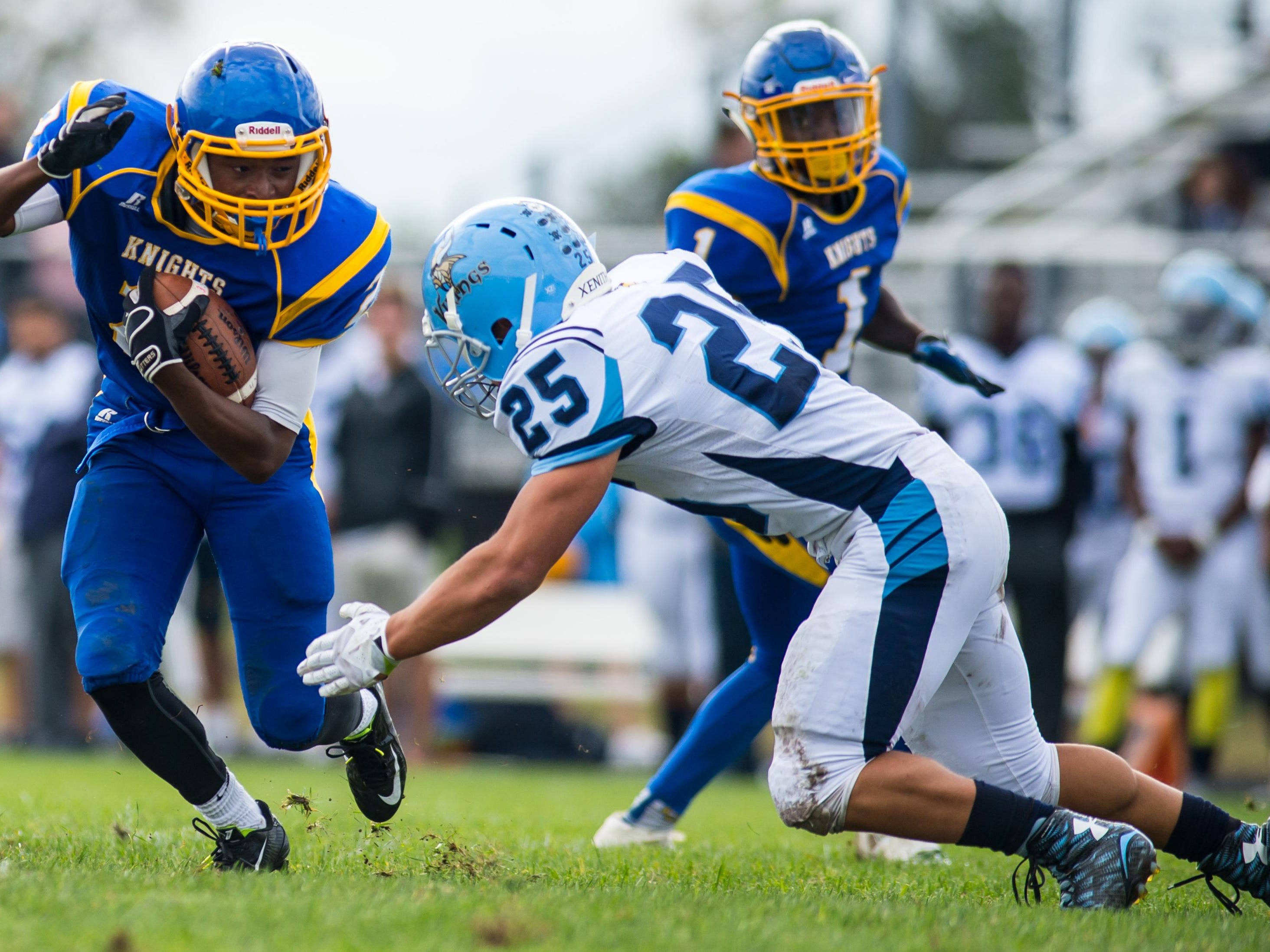 Sussex Central running back Kendrick Nocks (2) rushes against Cape Henlopen at Sussex Central.