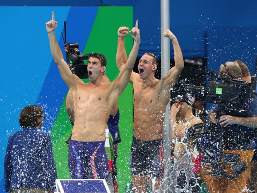 Michael Phelps (USA) and Caeleb Dressel (USA) celebrate