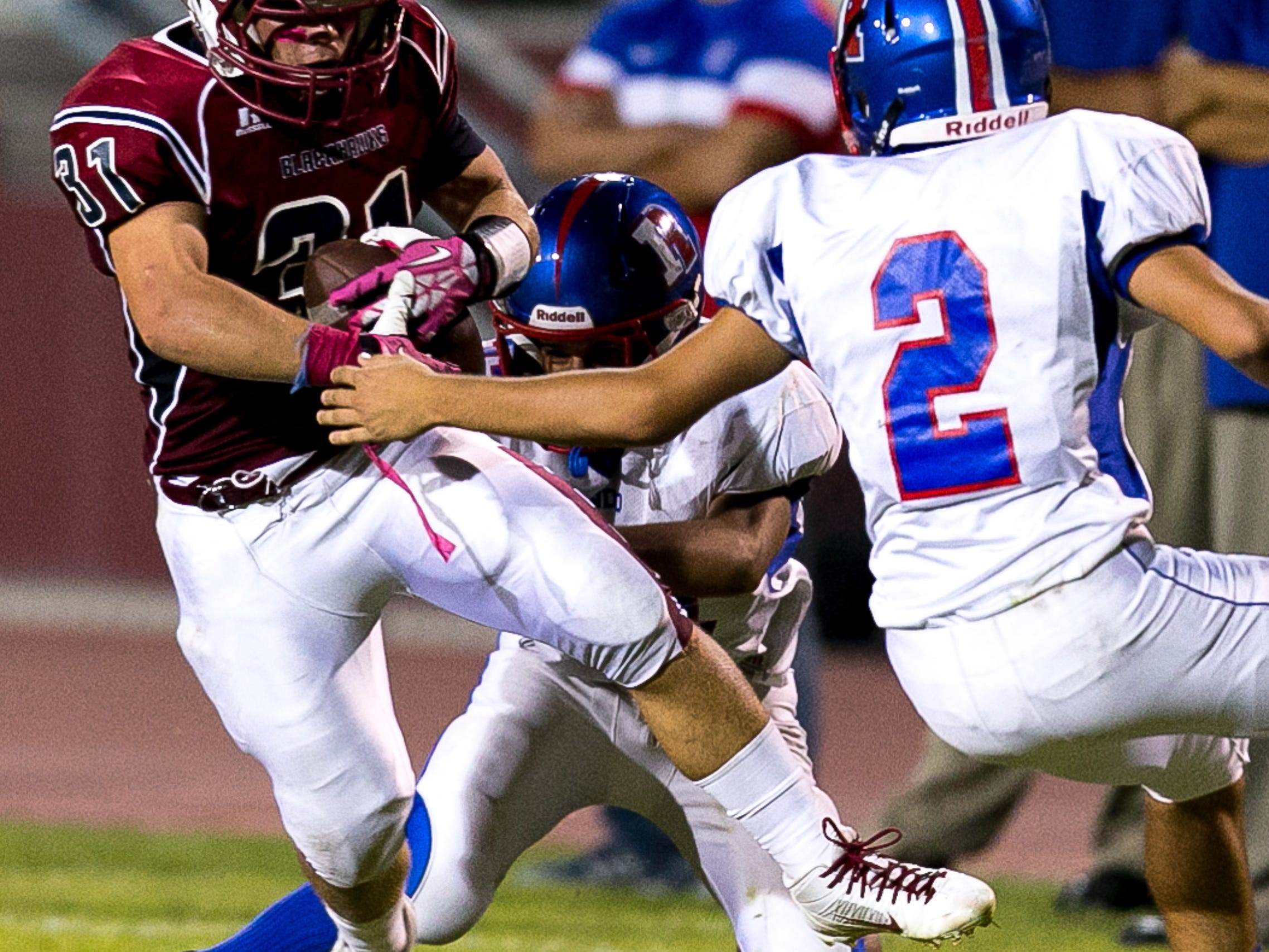 La Quinta’s Bryan Mello (No. 31) returns an interception for a touchdown against Indio during a DVL game Friday.