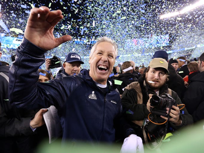 Seattle Seahawks head coach Pete Carroll celebrates after Super Bowl XLVIII against the Denver Broncos at MetLife Stadium.  Seattle Seahawks won 43-8.