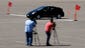 Television cameramen look on as a 2008 Toyota Prius' brakes are tested after a news conference in 2010. At the time, there were allegations of unintended acceleration in the Prius, which Toyota denied. The allegations were never proven.