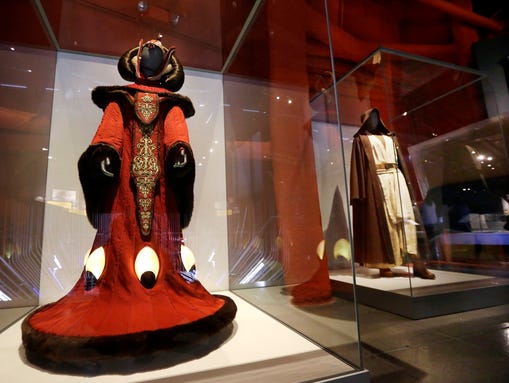 Queen Amidala's throne room gown, left, and Obi-Wan