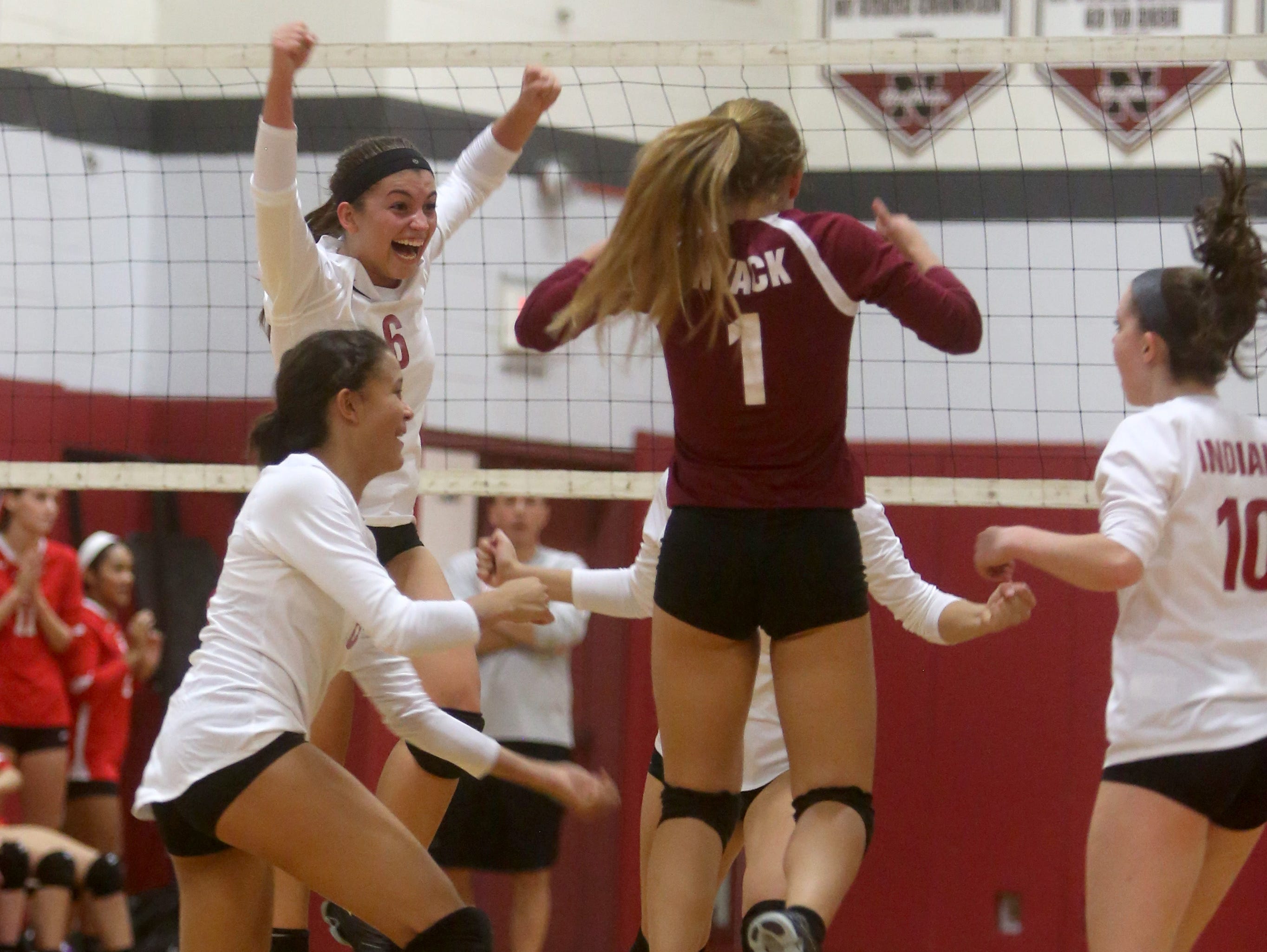 Nyack celebrates a point during a varsity volleyball match against Tappan Zee at Nyack High School Oct. 6, 2016. Nyack defeated Tappan Zee in three straight games, 25-12; 25-19; 25-22.
