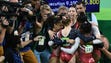 Aly Raisman (USA) and her teammates react during the