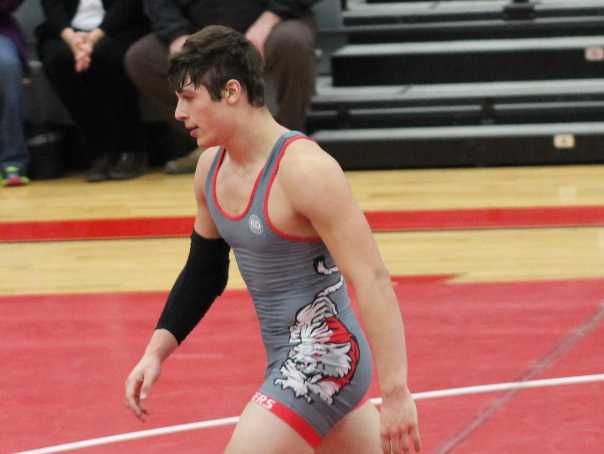 Jeffrey Botts leaves the mat after a victory for Bethel-Tate. As a junior, he advanced to the state tournament.