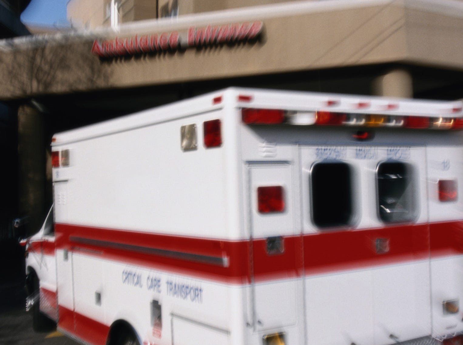 An ambulance arrives at a hospital emergency room.