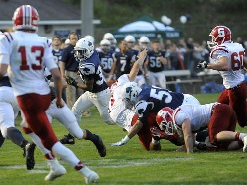 Granville freshman Brandon Haley breaks out of the pack during the opening win against Sheridan.