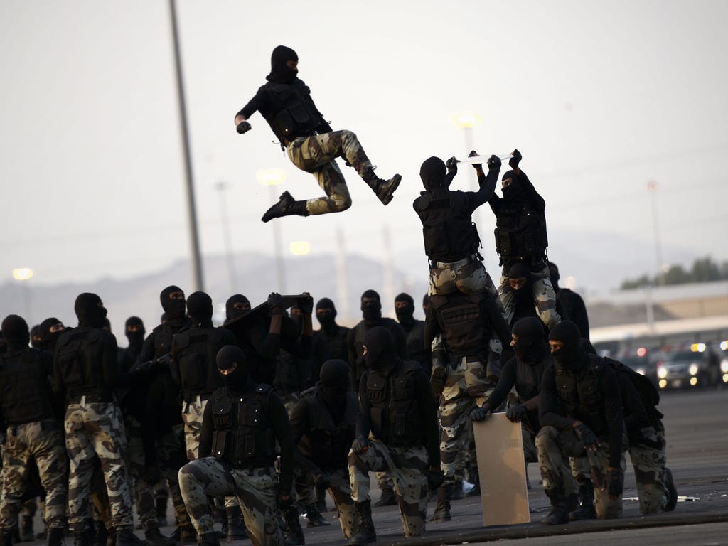 Members of the Saudi special police unit take part in a military parade in Mecca as more than 1 million faithful have already arrived in the Muslim holy city for the annual hajj pilgrimage which begins next week.