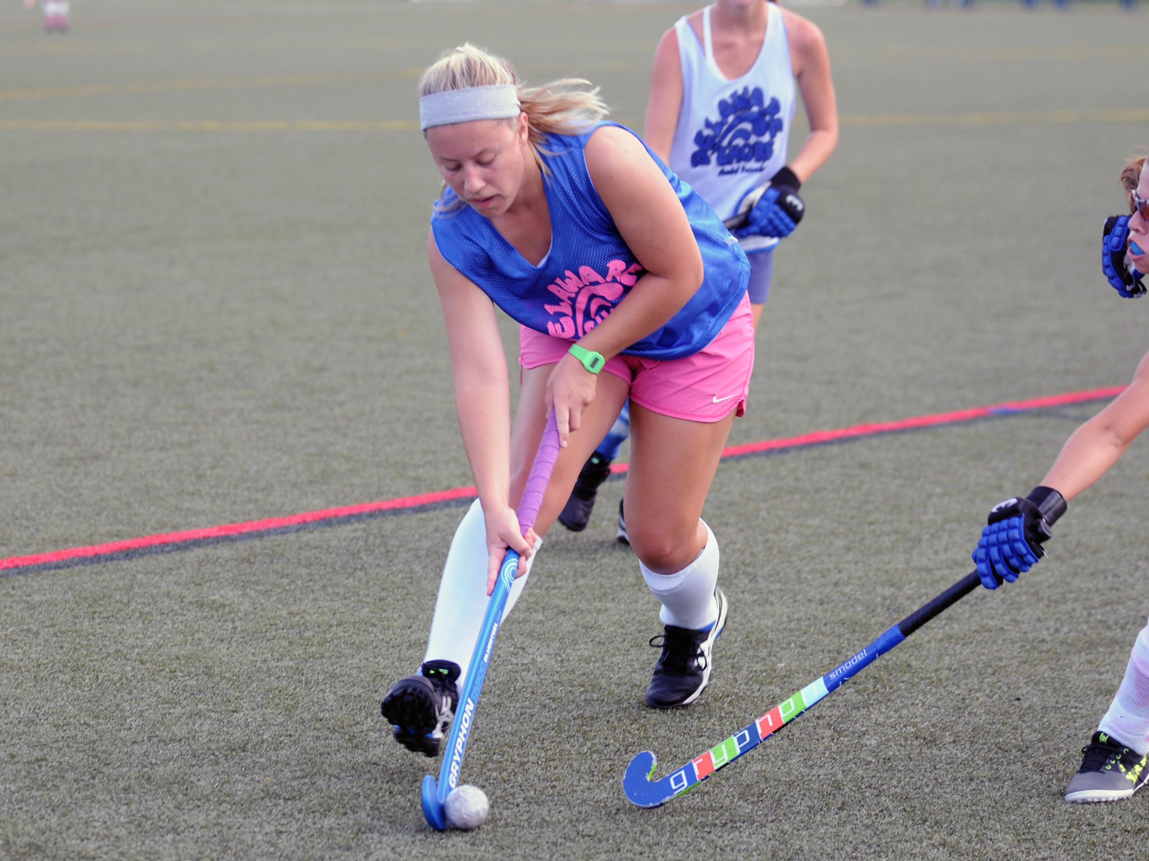 A Delaware Shore Field Hockey player works up the field during a summer league game at Cape Henlopen High School.