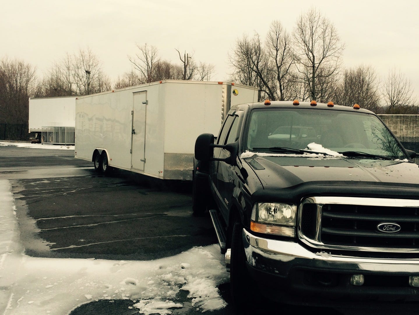 The truck and hauler -- seen in a photo taken earlier -- were stolen early Friday morning.