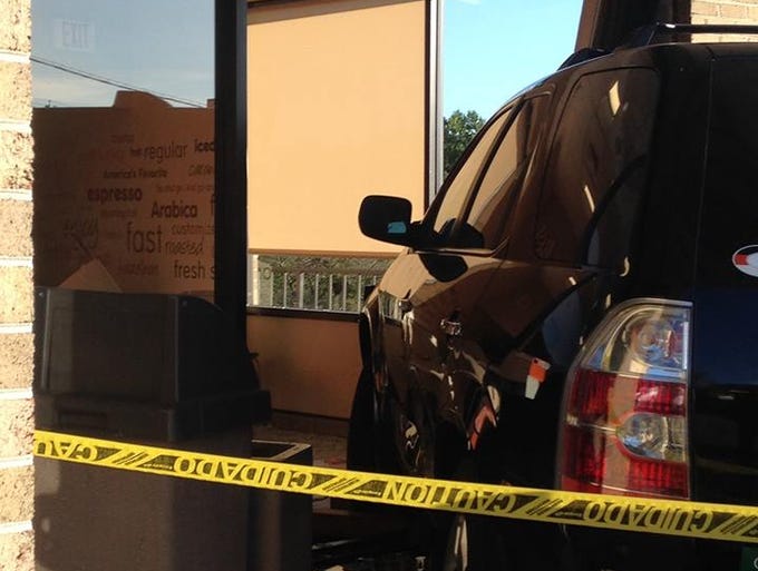 The scene where a vehicle crashed into a Dunkin Donuts in Maryland.