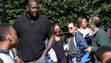 Sasha Obama, center and a friend check out former NBA