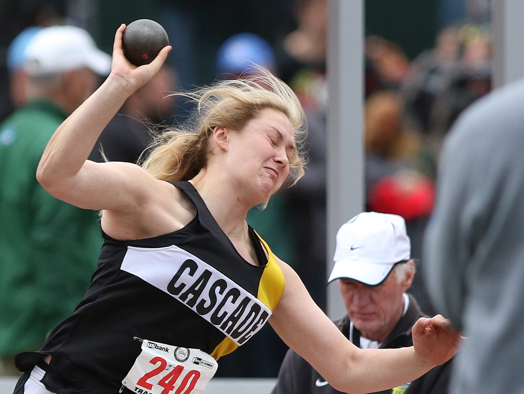 Cascade's Halle Wright competes in the shot put during the final day of the OSAA Track and Field State Championships at Hayward Field in Eugene, Ore.