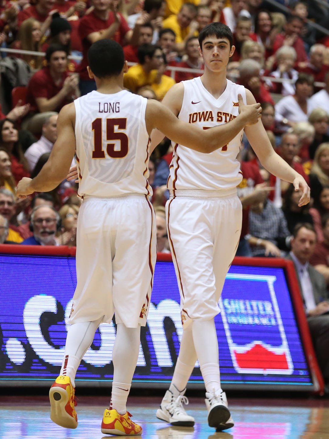 Iowa State's Georgios Tsalmpouris, right, is welcomed