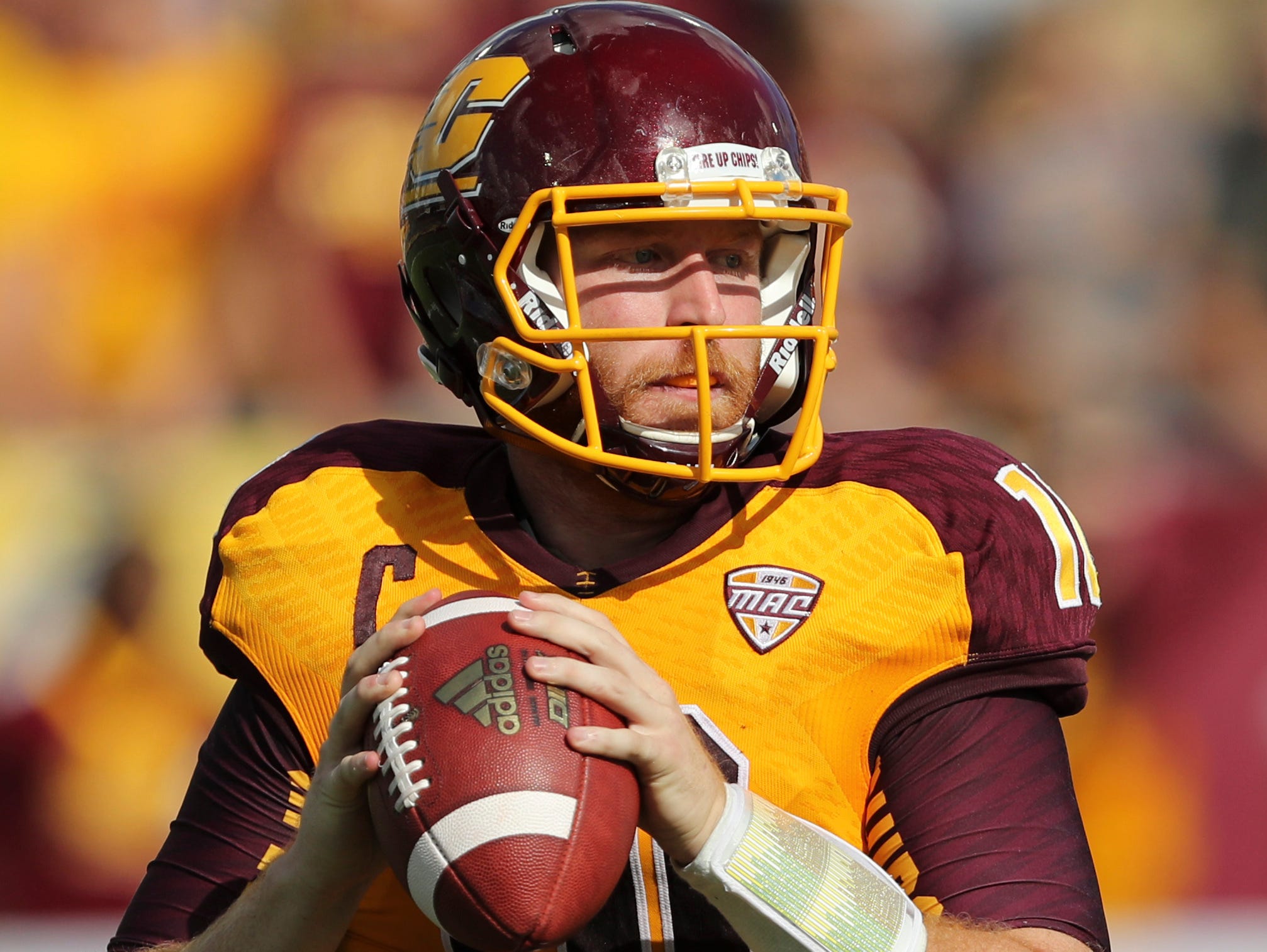 CMU senior and Lansing Catholic graduate Cooper Rush is a finalist for the William V. Campbell Trophy.