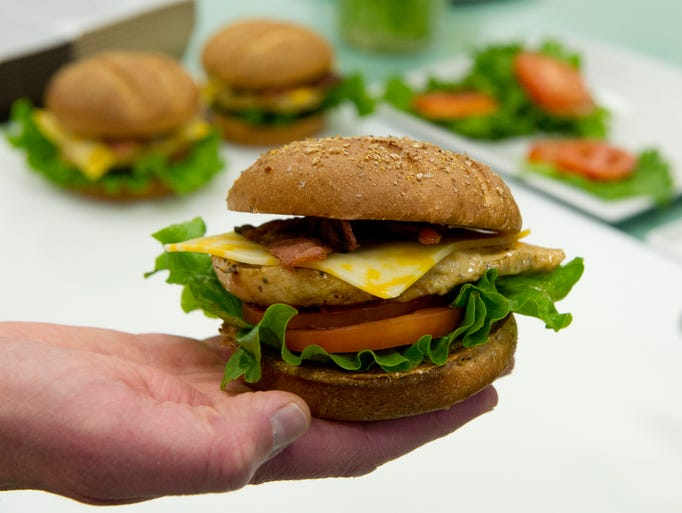 Brian Kolodziej with the new grilled chicken club sandwich test kitchen at Chick-fil-A headquarters.