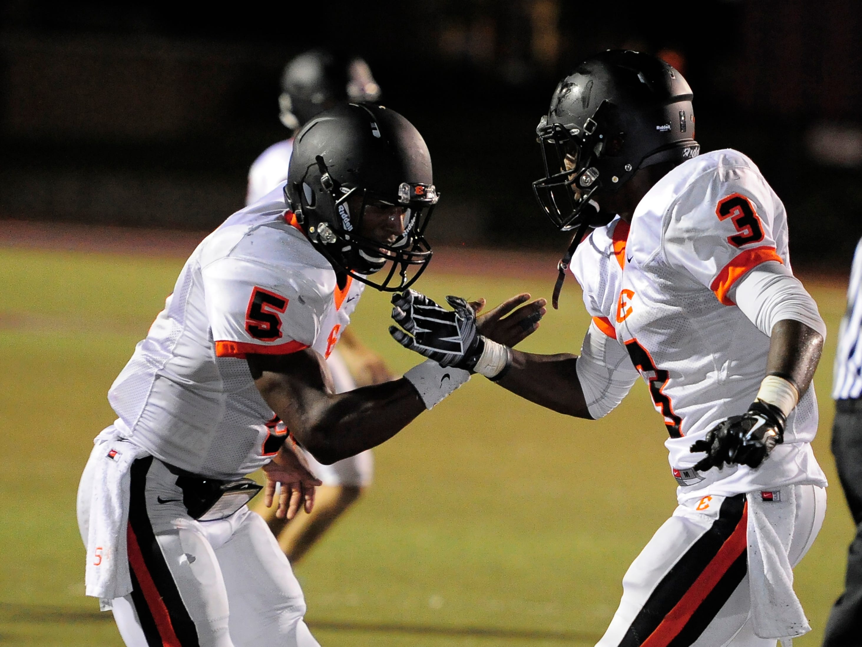 Quarterback P.J. Settles (5) and running back Darius Morehead (3) have helped Ensworth to a 6-1 start to the season.