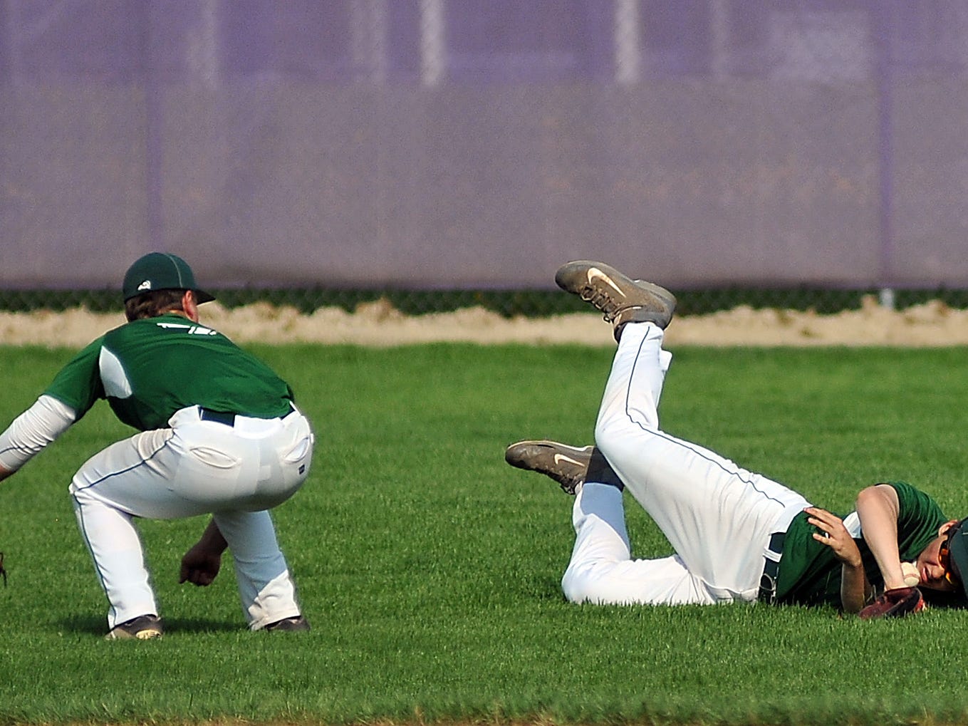 Madison's Josh Smith can't quite control the ball after a diving attempt during their game Thursday against Lexington.