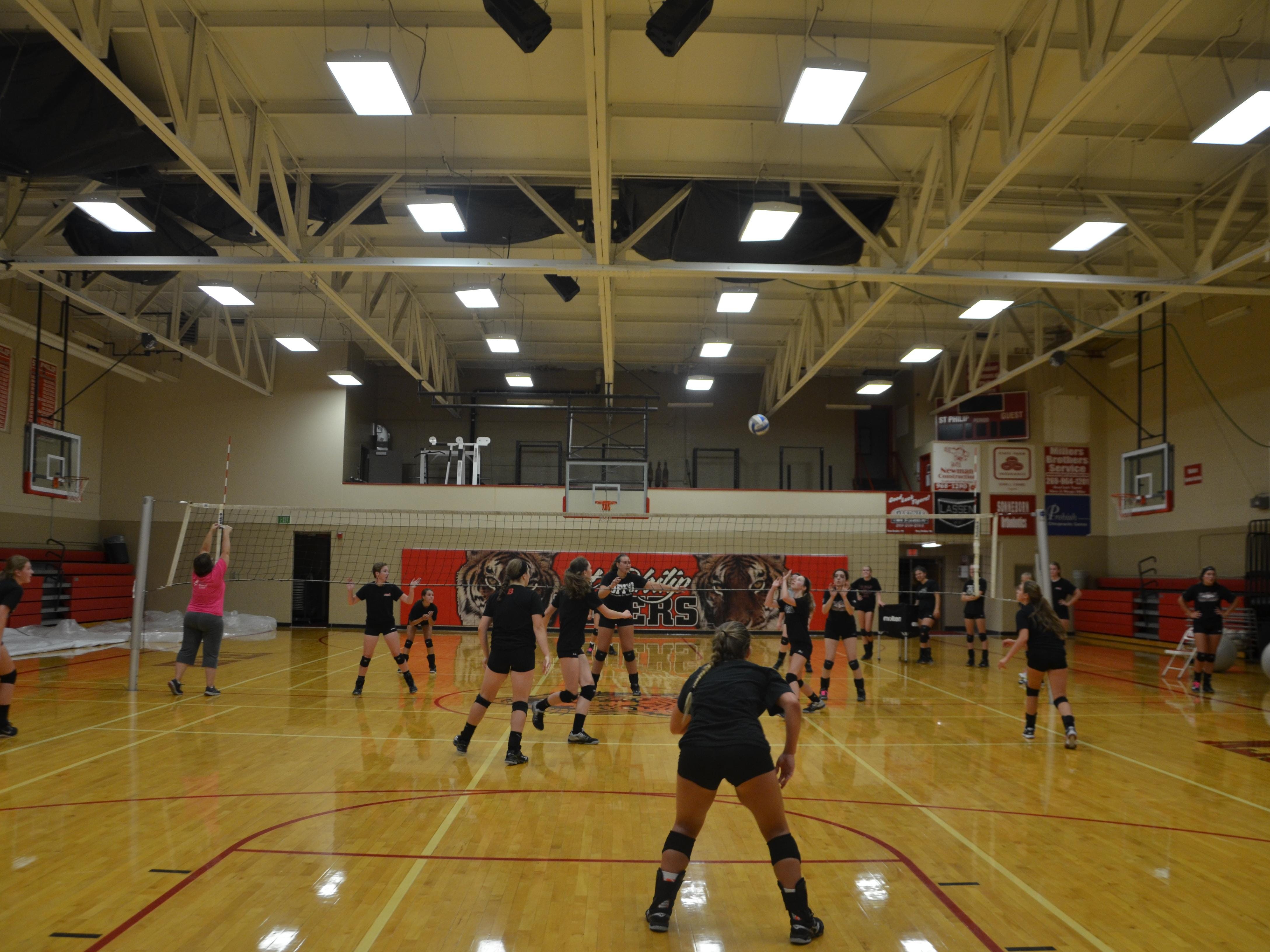 The St. Philip volleyball team scrimmages during the first practice of the season on Wednesday.