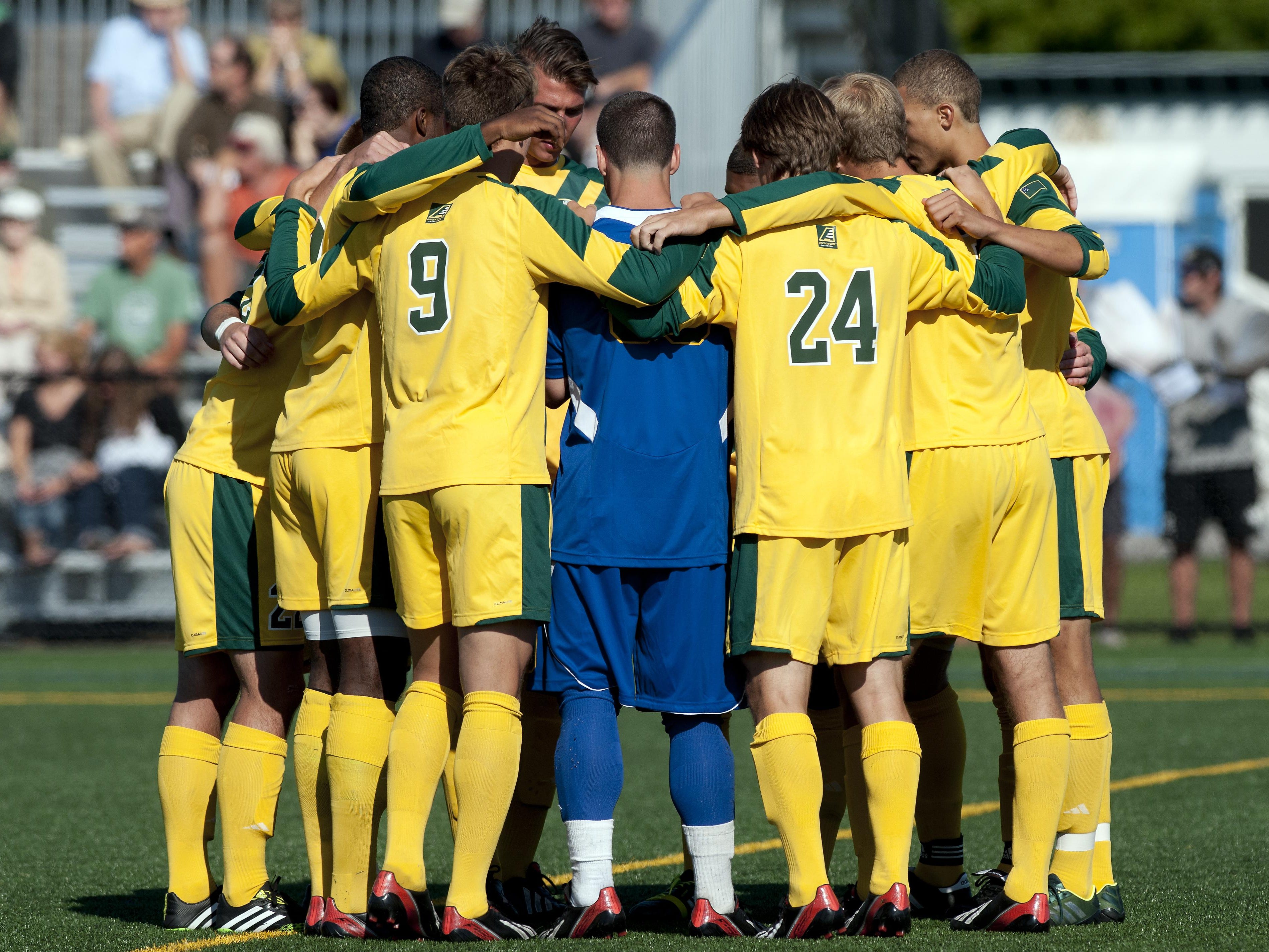 The Catamounts huddle together before the start of the men's soccer game between the Colgate Raiders and the Vermont Catamounts at Virtue field on Friday afternoon September 6, 2013 in Burlington, Vermont. (BRIAN JENKINS, for the Free Press)