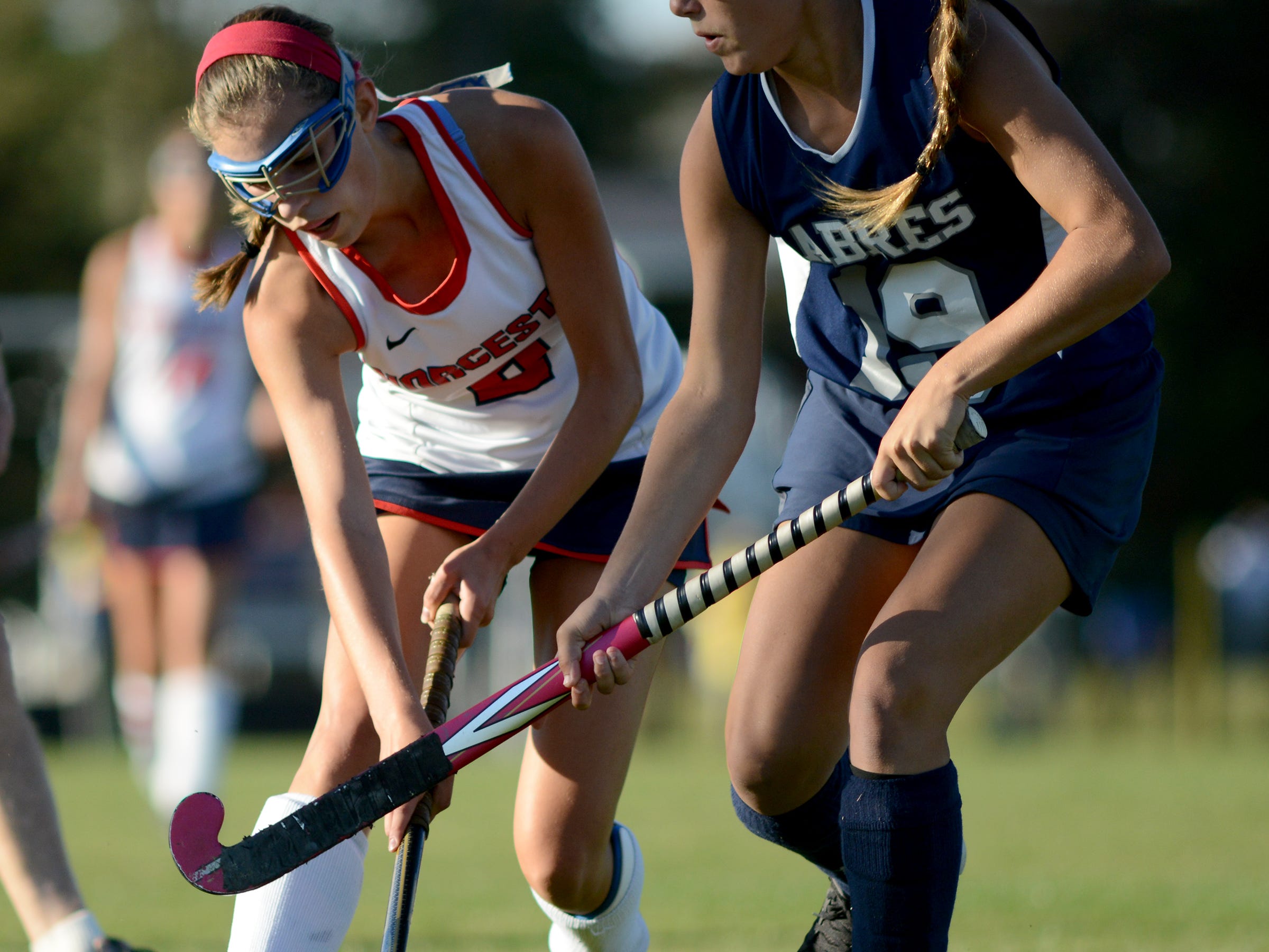 St’s Peter and Paul’s Kelly Hertelendy attempts to take the ball from Worcester Prep’s Isabel Carulli during play Monday afternoon at Worcester Prep in Berlin.