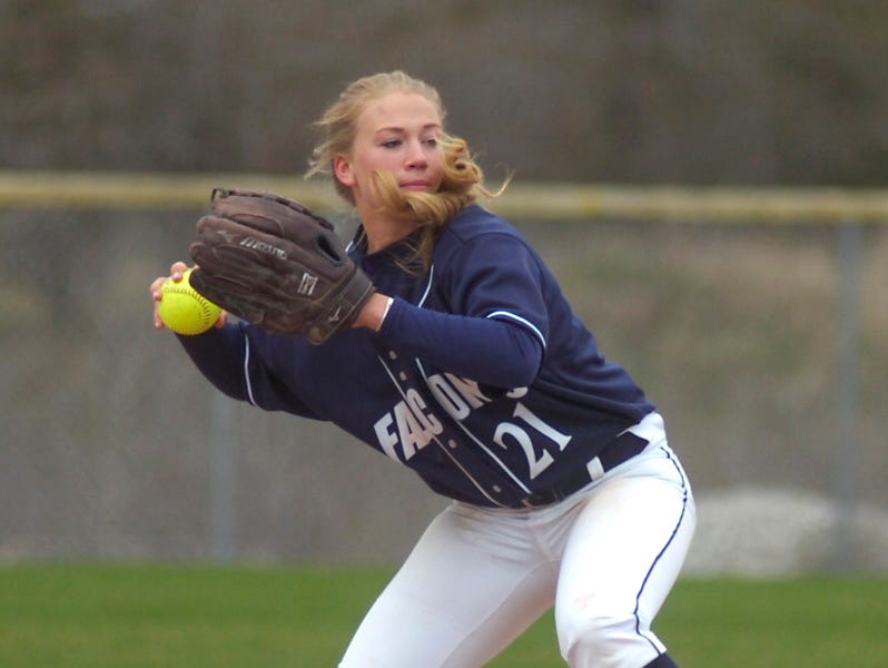 Infielder Claire Knie hurries to get the ball to the first baseman.